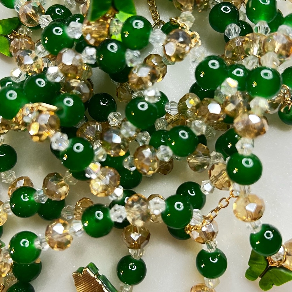 #150 Elegant Green and Gold Beaded Bracelet In Butterfly Charm